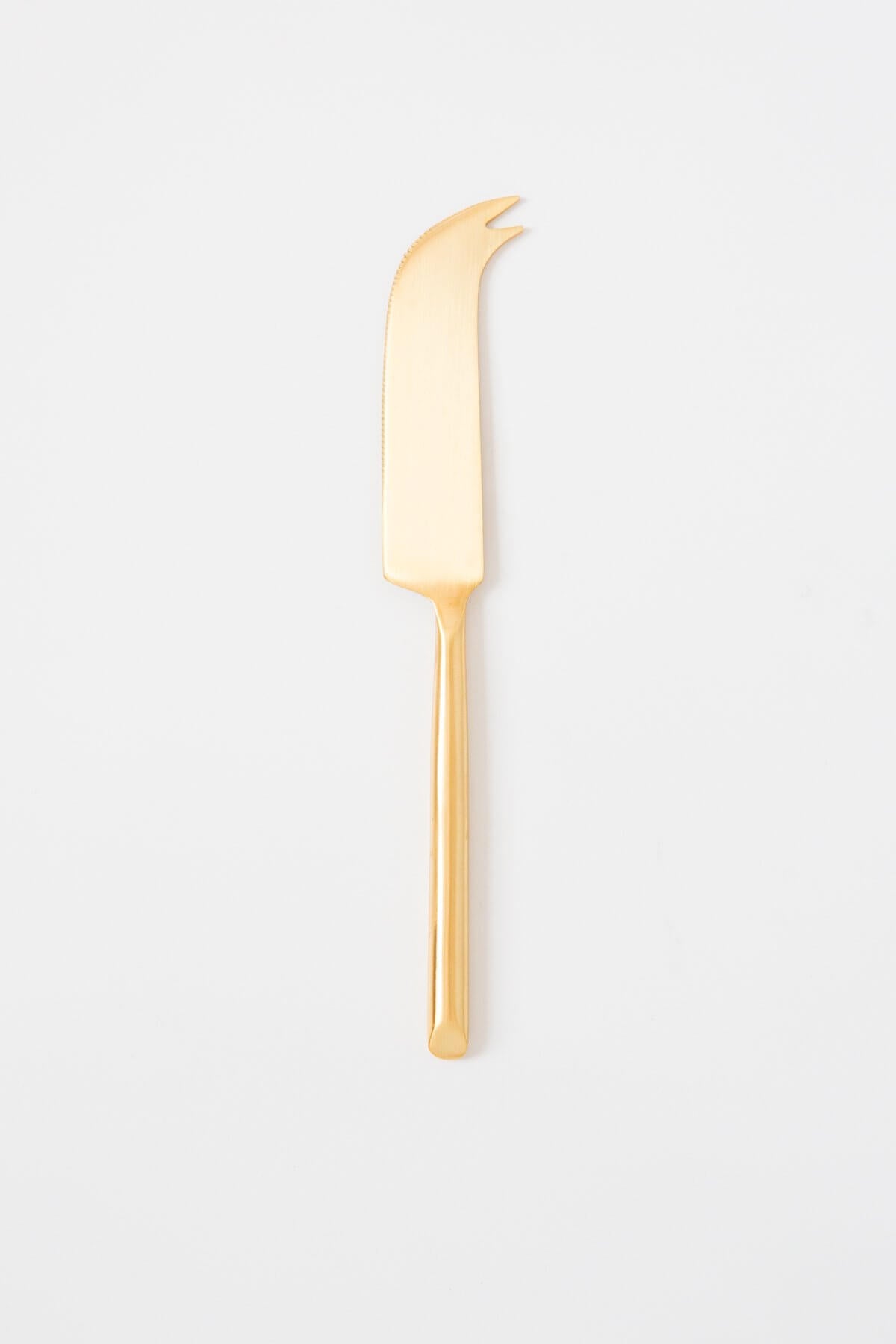 https://www.palmandperkins.com/cdn/shop/products/BeHome_MatteGoldCheeseKnife_01_1200x.jpg?v=1605920422