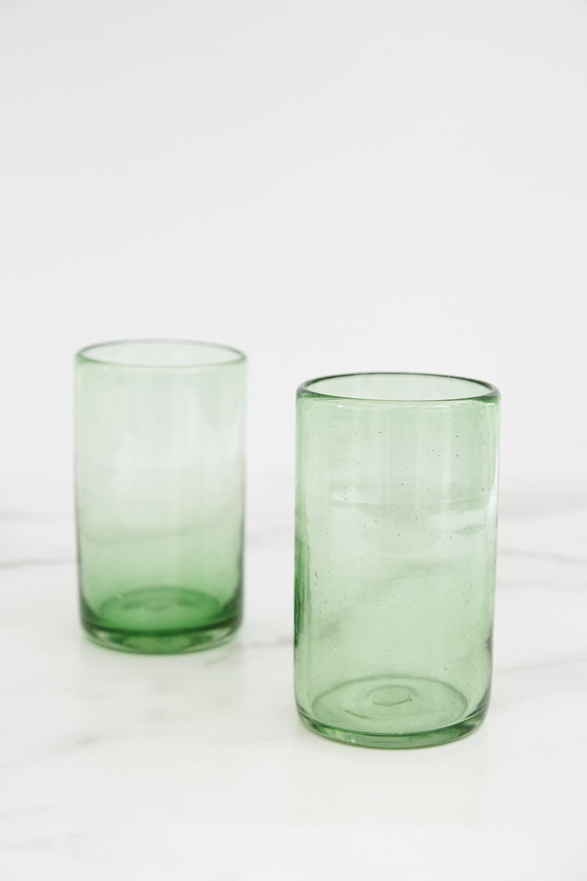 https://www.palmandperkins.com/cdn/shop/products/Copavic_LargeDrinkingGlass_Green_2_1200x.jpg?v=1642629254